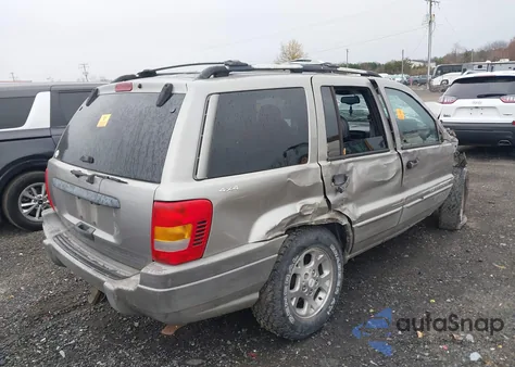 2000 Jeep Grand Cherokee Laredo from USA, damaged, VIN 1J4GW48S4YC213838